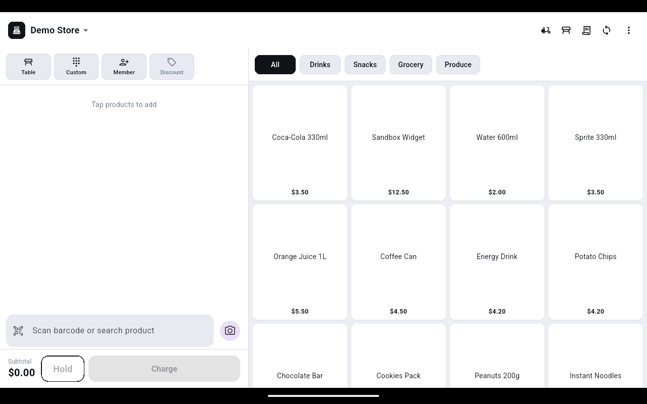 Register screen with an empty cart on the left and a product grid with category chips on the right